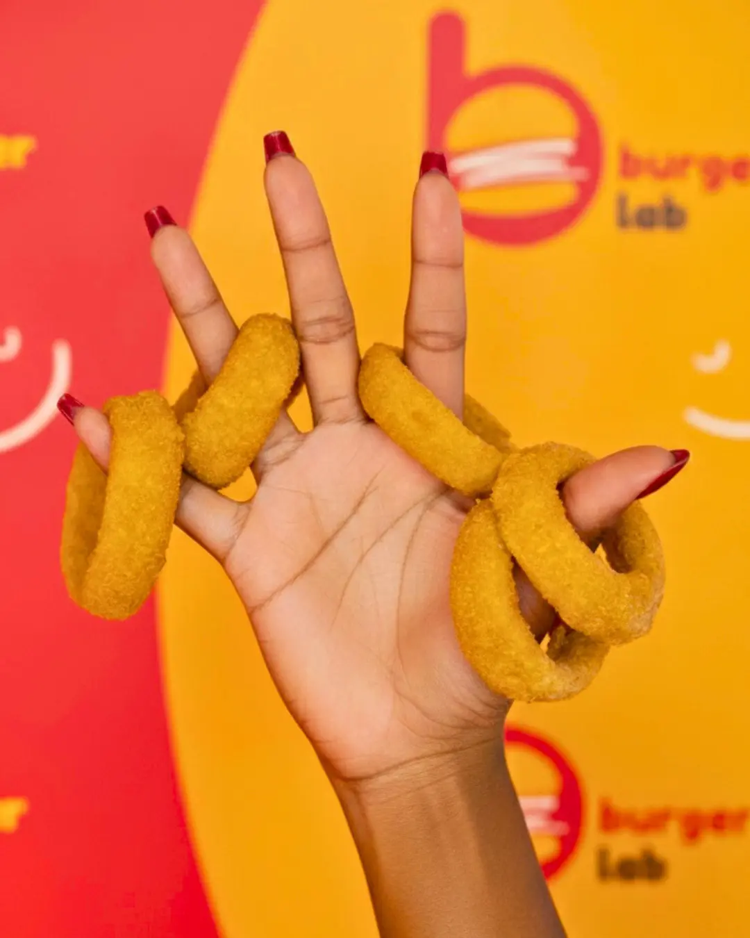 Playful presentation of golden onion rings